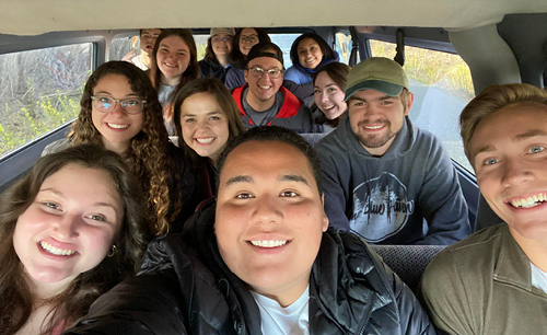 Students in a passenger van