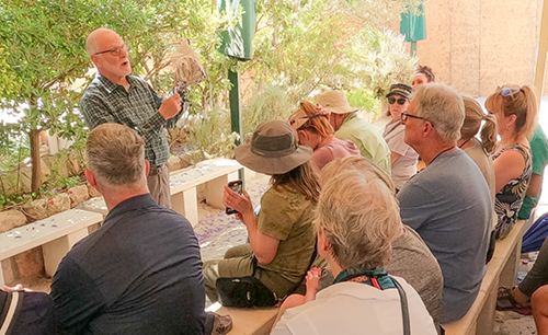 Dr. Jesse Long giving an archeological presentation