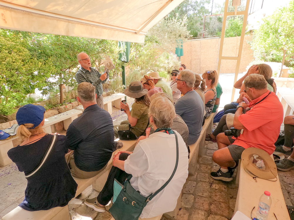 Dr. Jesse Long gives a lesson at an outdoor site overseas