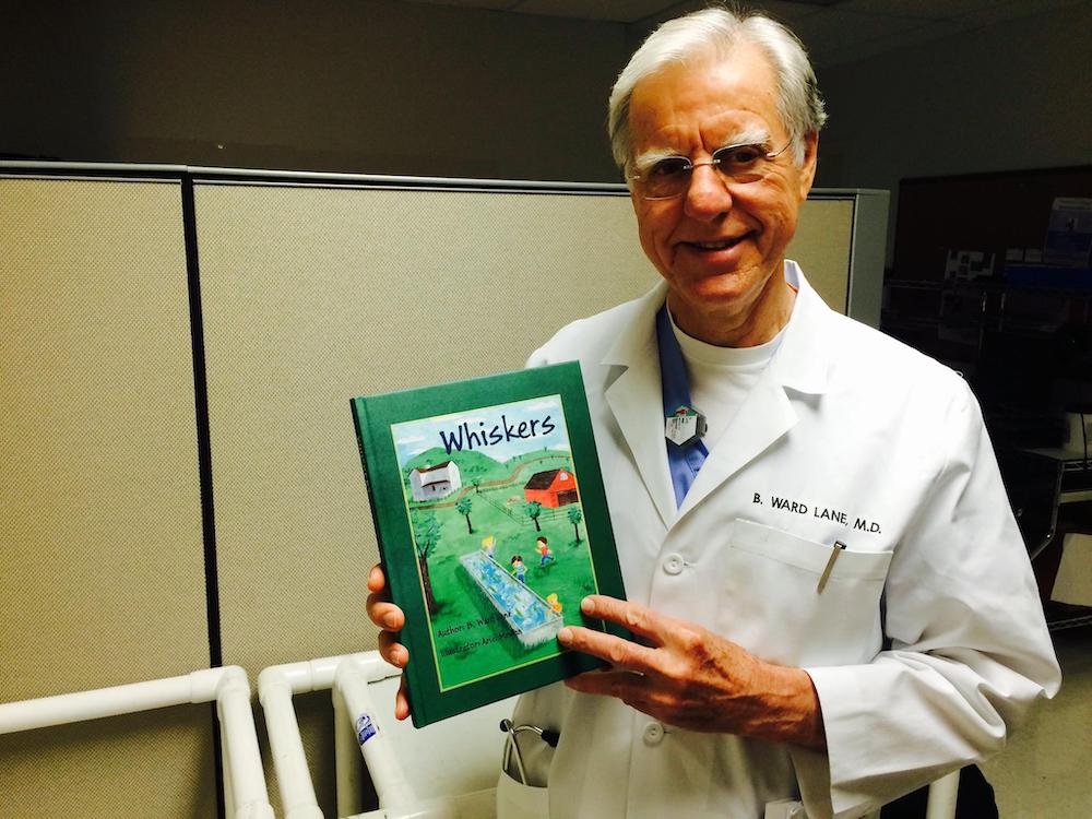 Dr. B. Ward Lane poses with his children's book