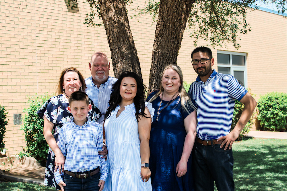 Emma VerHage poses with her family after graduating from Lubbock Christian University