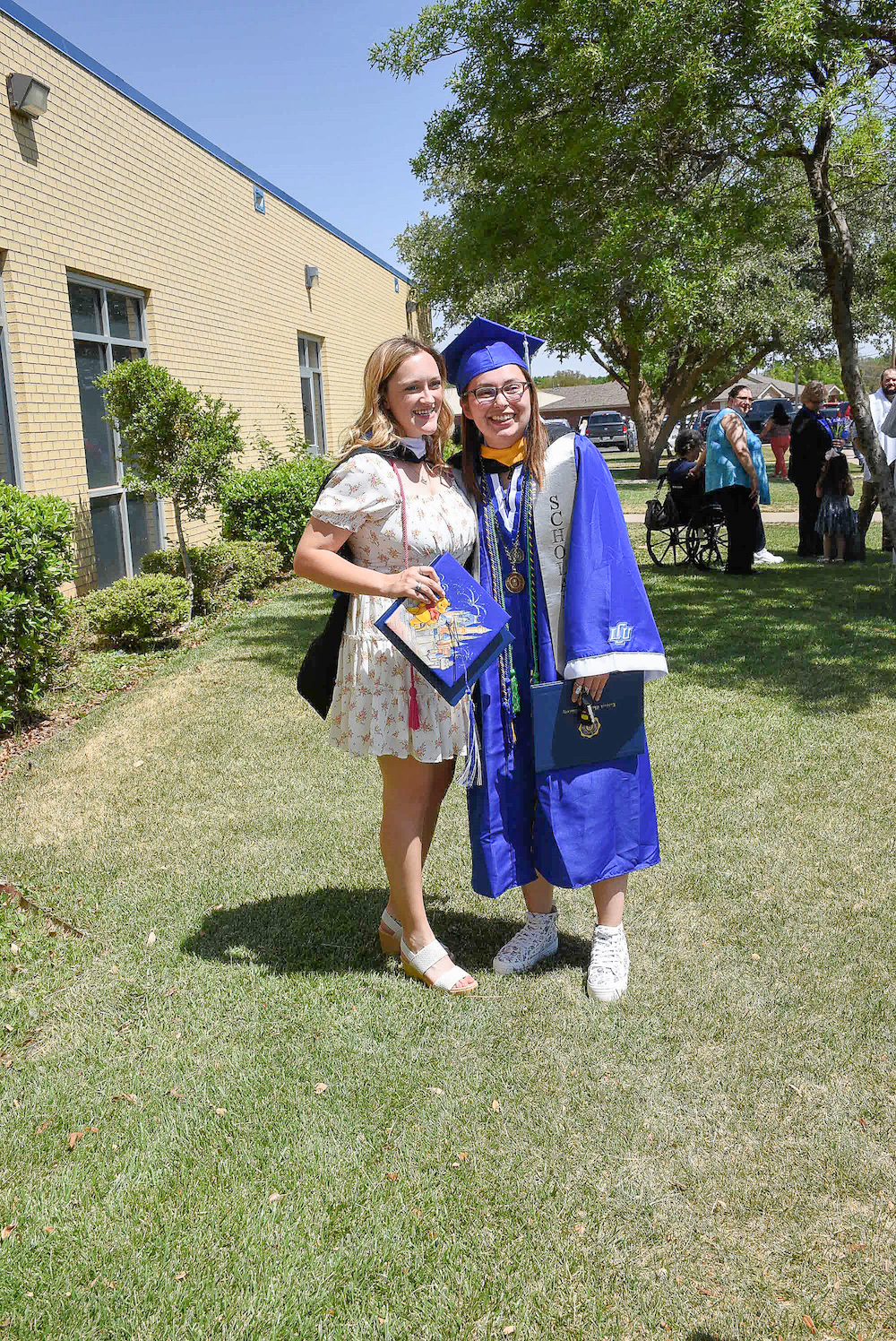 Nicole celebrates graduating from LCU with a friend