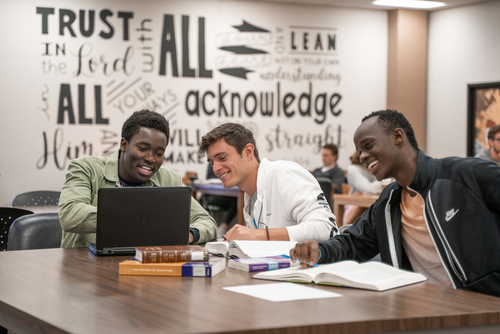 LCU student athletes studying in the library