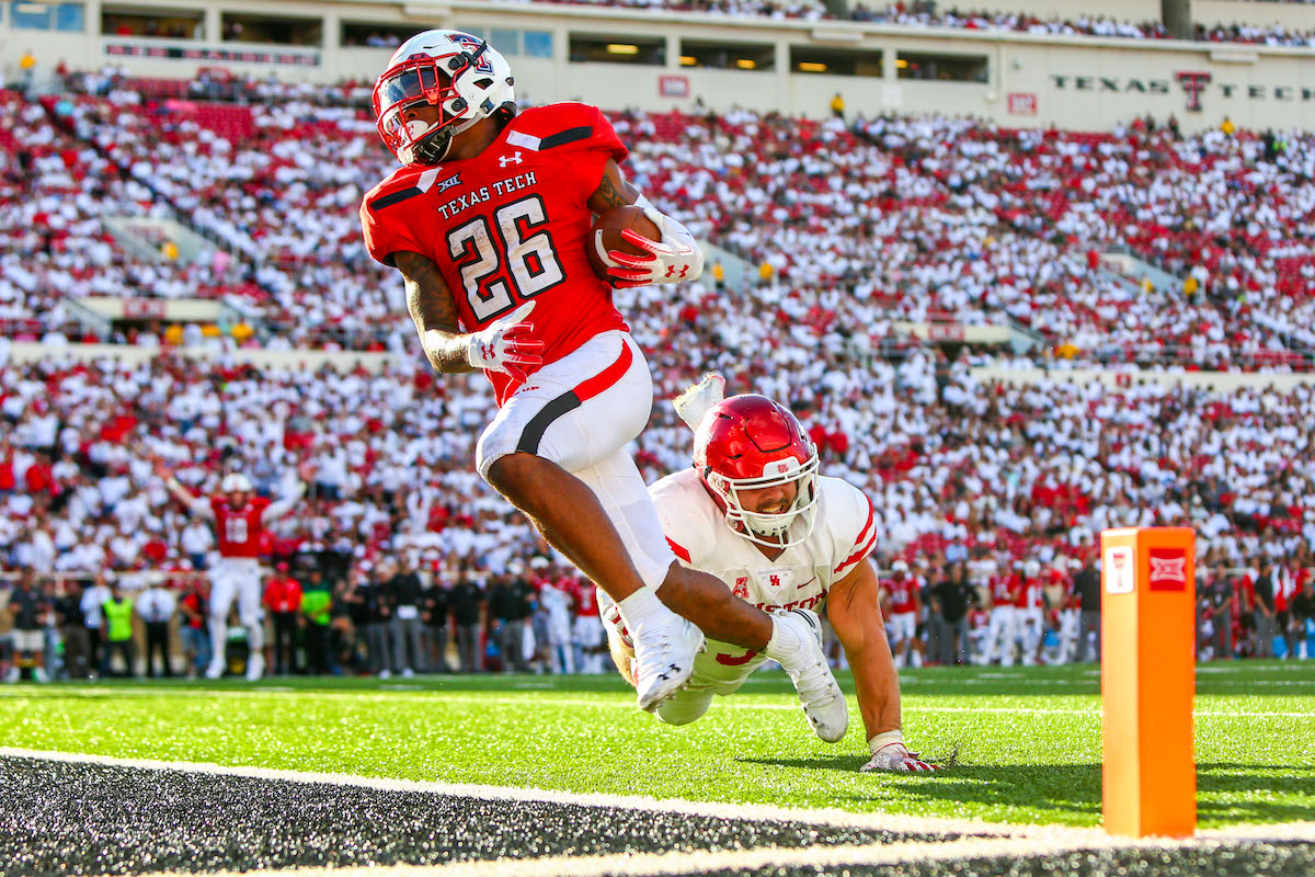 a Texas Tech football player scores a touchdown