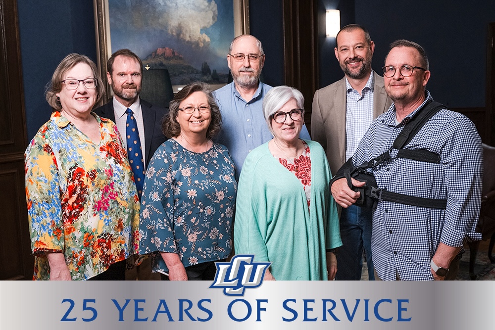 faculty and staff celebrating 25 years of service