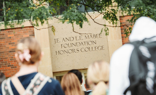 Honors college name engraved on building