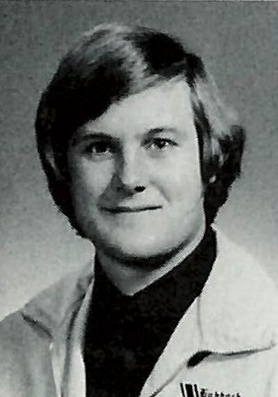 Black and White yearbook photo of Mark