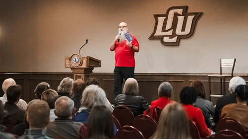 Marty Solomon speaking at LCU in the Baker Conference Center from 2023