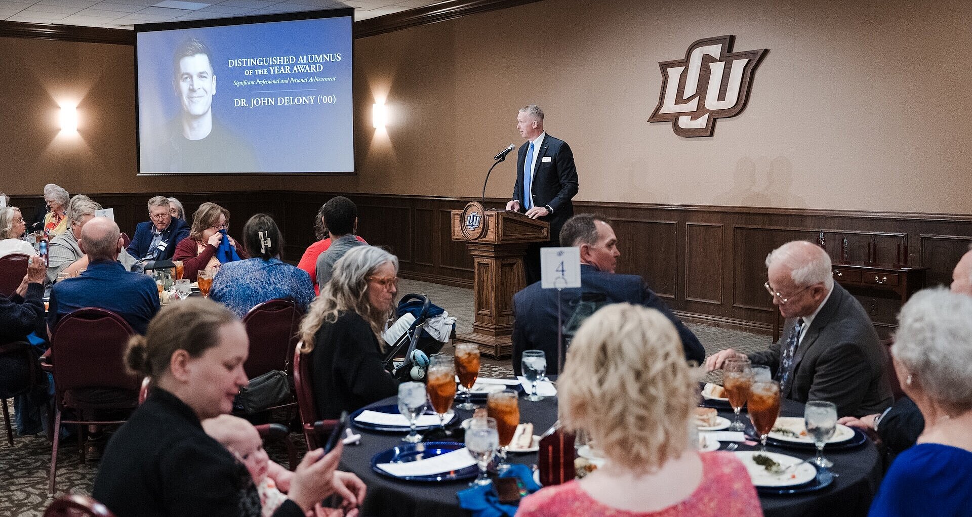 President McDowell speaking at the alumni awards dinner in the baker