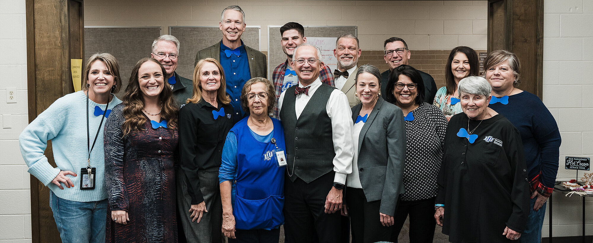 Sam Ayers surrounded but his faculty and staff members