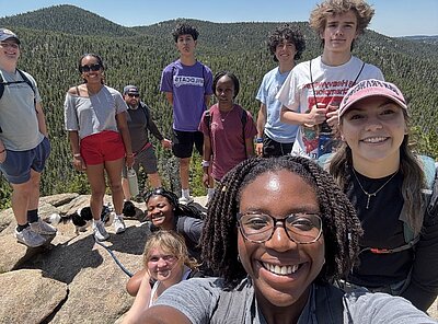 Ruth Blayee with a group hiking in colorado