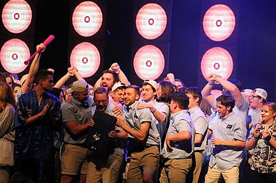 Alpha Chi Delta members celebrate their Master Follies victory.