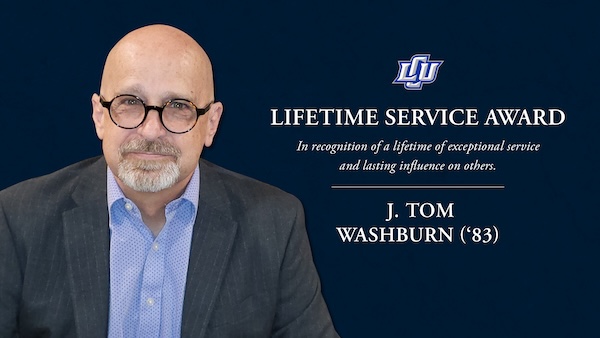 Tom Washburn headshot with award logo to his right