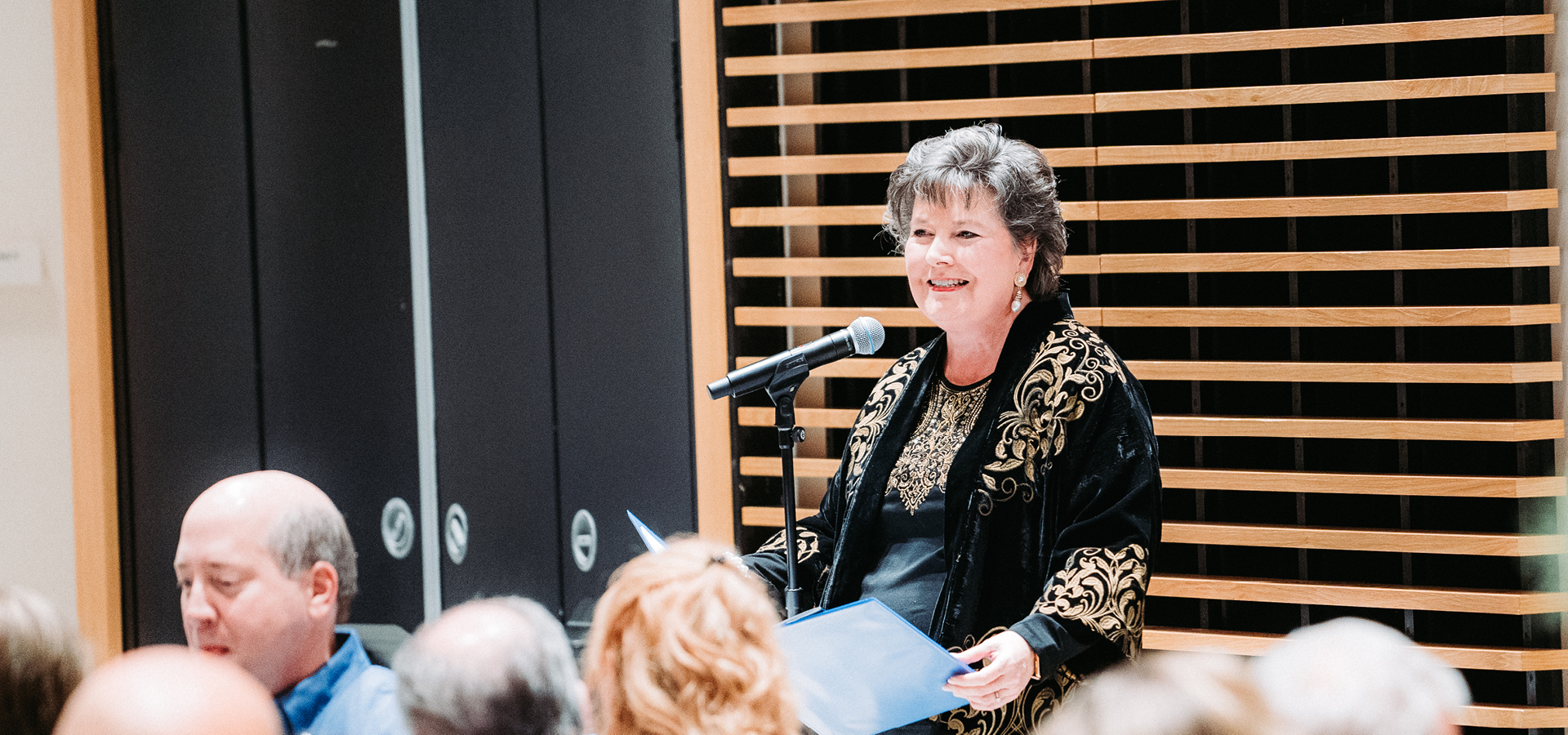 Laurie Doyle speaking at an event