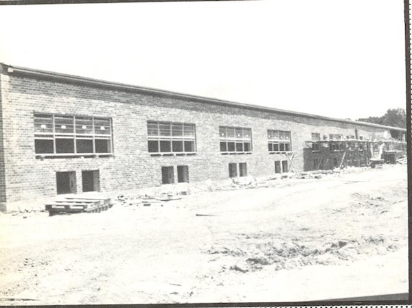 an old black and white photo of school building